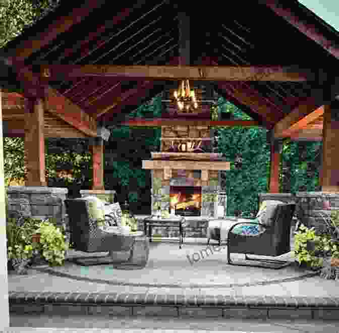 A Covered Outdoor Patio With A Seating Area And A Fireplace Barclay Butera Getaways And Retreats