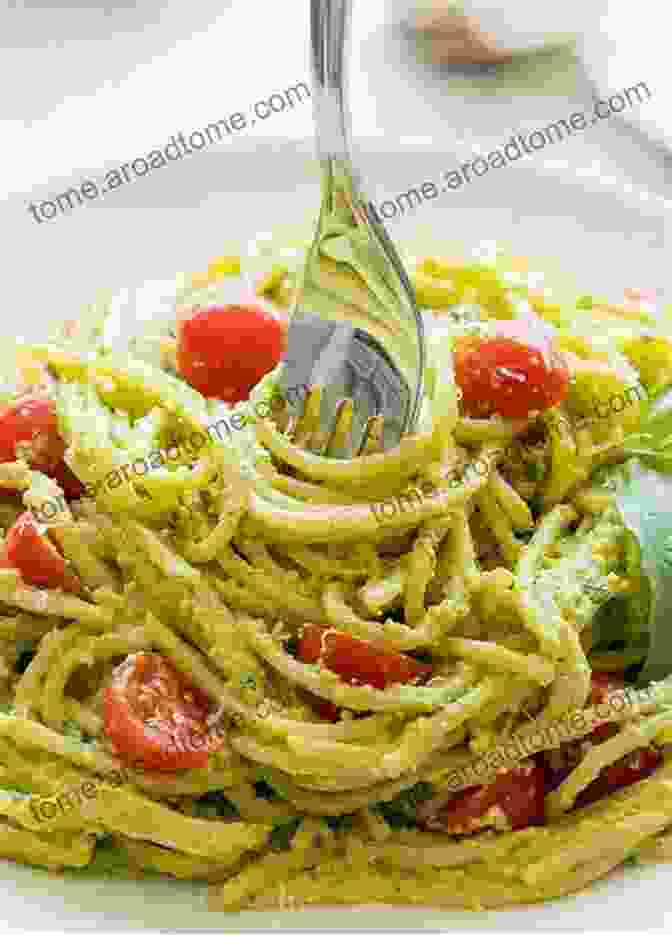 A Plate Of Creamy Avocado Pesto Pasta With Fresh Tomatoes And Basil. Surviving The COVID 19 Pandemic As A Gourmet Vegan