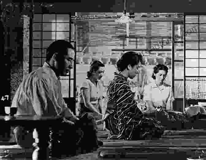 A Still From Yasujiro Ozu's Tokyo Story, Depicting An Elderly Couple Seated At A Table Dialectics Without Synthesis: Japanese Film Theory And Realism In A Global Frame