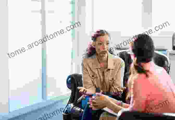 Image Of A Therapist And Client Engaged In A Psychotherapy Session, Exploring Psychological Issues That Influence Behavior. A Foundational Explanation Of Human Behavior